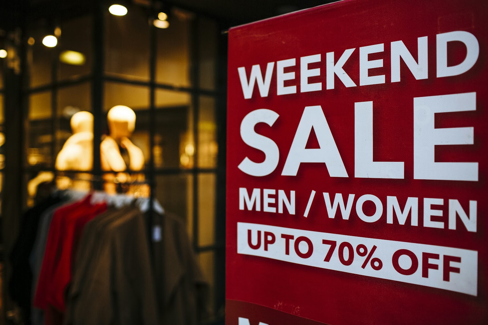 weekend sale sign for men and women