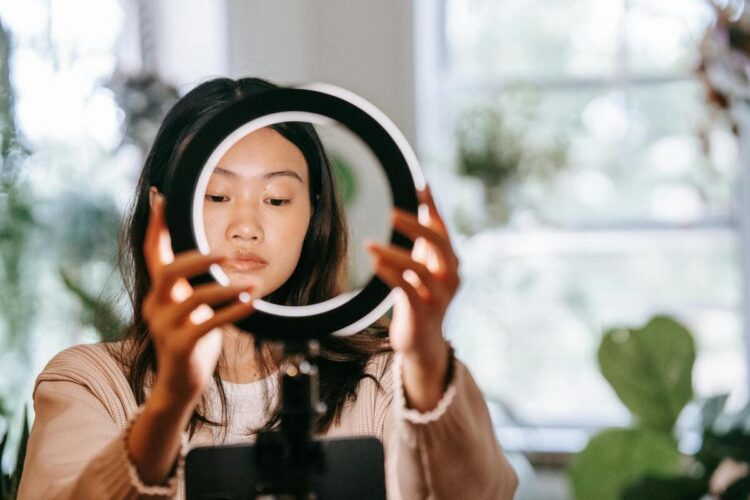 a girl adjusting cam