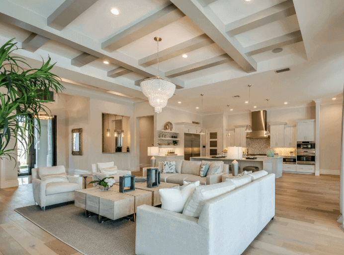 A luxurious living room with stylish furniture and a large window