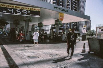 Man wearing streetwear at gas station