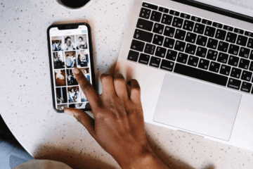 Person using phone and laptop for trendy tech accessories